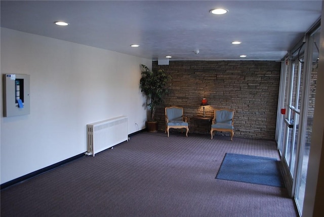 5120 5th Ave Unit 103, Shadyside, PA 15232 - living area featuring radiator, carpet, recessed lighting, and baseboards