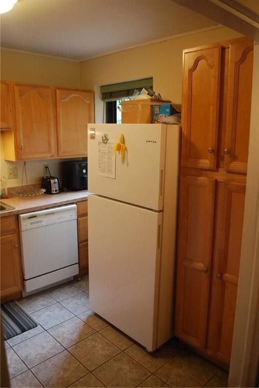 5120 5th Ave Unit 103, Shadyside, PA 15232 - kitchen with white appliances, light countertops, light tile patterned flooring, and light brown cabinetry