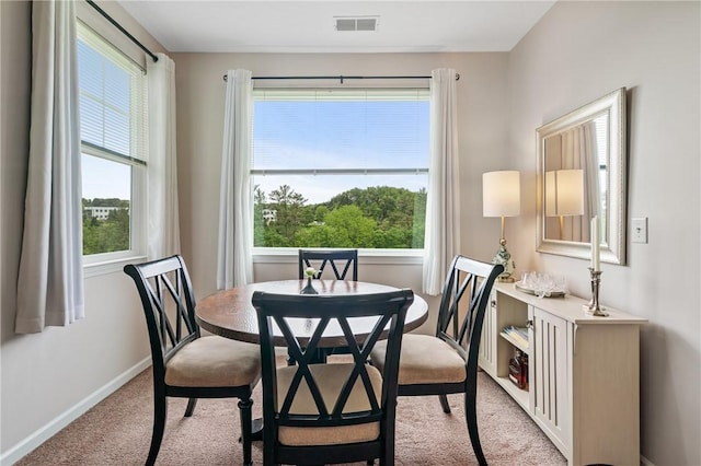 832 Eagle Pointe Dr, Cecil, PA 15317 - carpeted dining room with plenty of natural light and baseboards