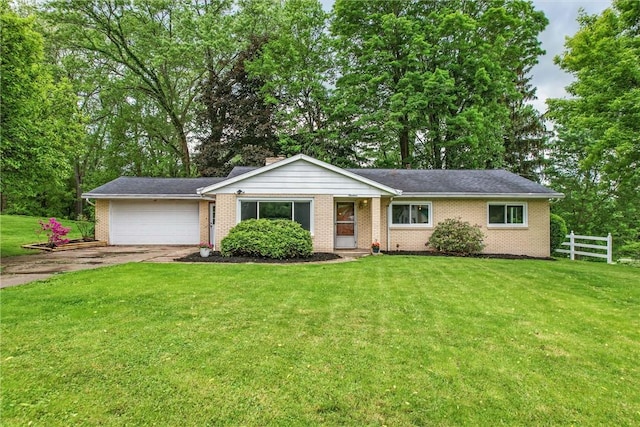 19 Ruth St, Hempfield Twp Mer, PA 16125 - single story home with a garage, driveway, brick siding, and view of scattered trees
