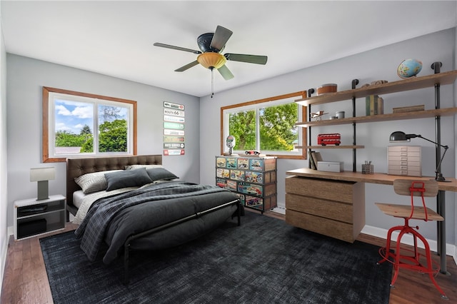 19 Ruth St, Hempfield Twp Mer, PA 16125 - bedroom with an office area, dark wood finished floors, ceiling fan, and baseboards