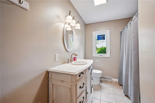 19 Ruth St, Hempfield Twp Mer, PA 16125 - full bathroom featuring vanity, toilet, tile patterned flooring, and baseboards