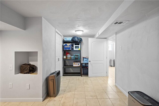260 Bluemont Dr, West Mifflin, PA 15122 - hallway featuring light tile patterned floors and baseboards