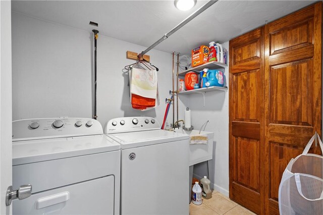 260 Bluemont Dr, West Mifflin, PA 15122 - laundry area featuring washer and dryer and light tile patterned flooring