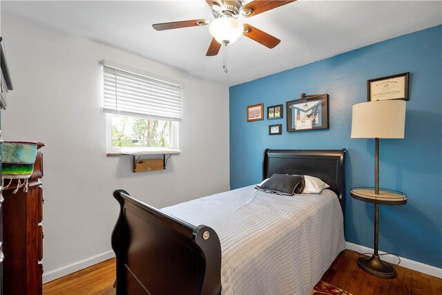 260 Bluemont Dr, West Mifflin, PA 15122 - bedroom featuring baseboards, wood finished floors, and a ceiling fan
