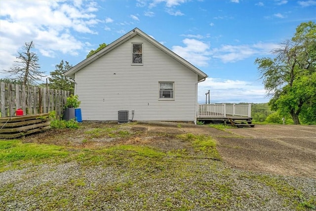 1675 Clairton Rd, West Mifflin, PA 15122 - view of side of home with a wooden deck and cooling unit