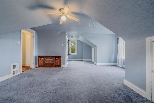 1675 Clairton Rd, West Mifflin, PA 15122 - bonus room with a textured ceiling, ceiling fan, carpet flooring, and baseboards