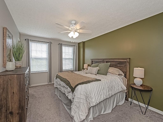 104 Rylie Dr, Jackson Twp But, PA 16037 - carpeted bedroom featuring baseboards, a textured ceiling, and ceiling fan