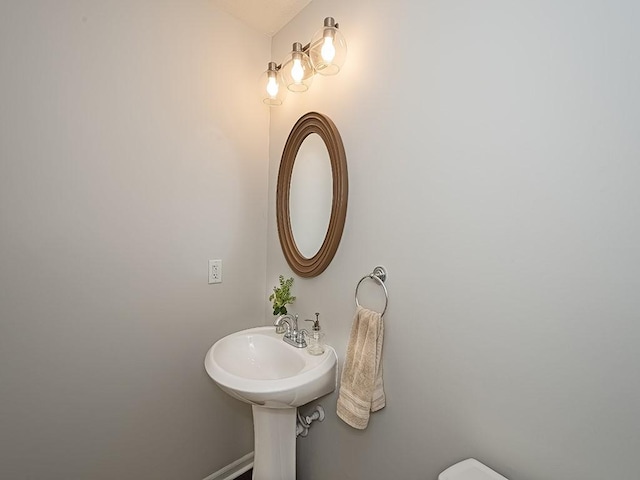 104 Rylie Dr, Jackson Twp But, PA 16037 - half bathroom with toilet and baseboards
