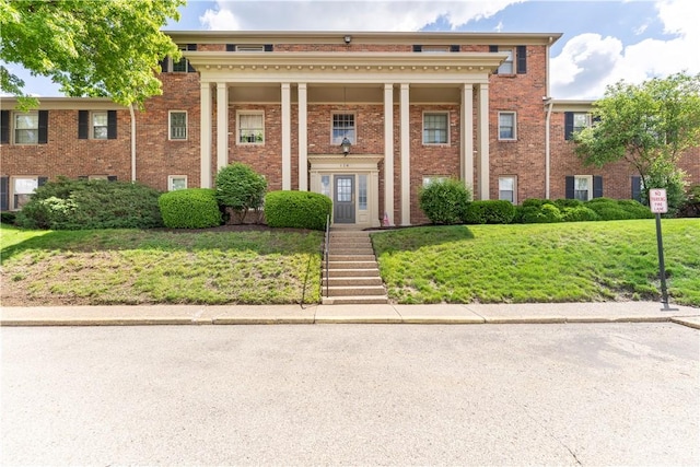 126 Jamestown Ct Unit C, Scott Twp Sal, PA 15216 - view of front of property with brick siding and a front lawn