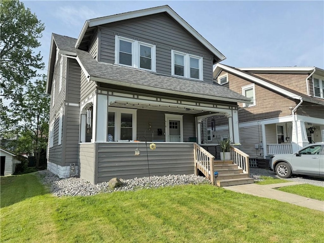 410 E Meyer Ave, New Castle/2Nd, PA 16105 - view of front of home with covered porch, a front yard, and roof with shingles