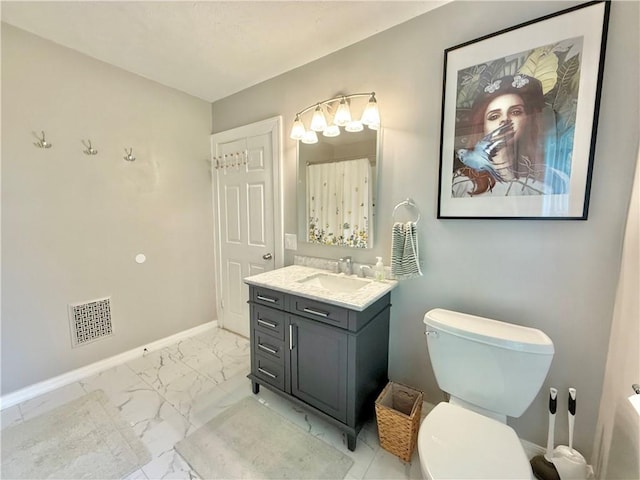 410 E Meyer Ave, New Castle/2Nd, PA 16105 - bathroom with marble look tile flooring, vanity, toilet, and baseboards