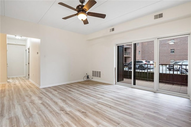 5600 Munhall Rd Unit 201, Squirrel Hill, PA 15217 - empty room featuring light wood-style flooring, a ceiling fan, and baseboards
