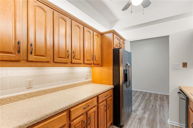 5600 Munhall Rd Unit 201, Squirrel Hill, PA 15217 - kitchen featuring stainless steel appliances, ceiling fan, light wood finished floors, light countertops, and brown cabinets