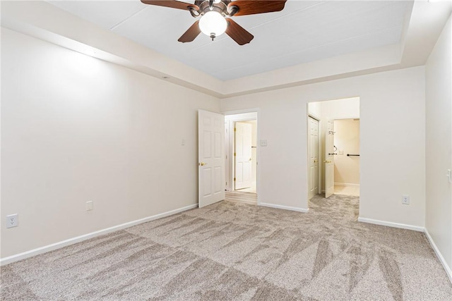 5600 Munhall Rd Unit 201, Squirrel Hill, PA 15217 - unfurnished bedroom featuring carpet, baseboards, connected bathroom, a ceiling fan, and a raised ceiling