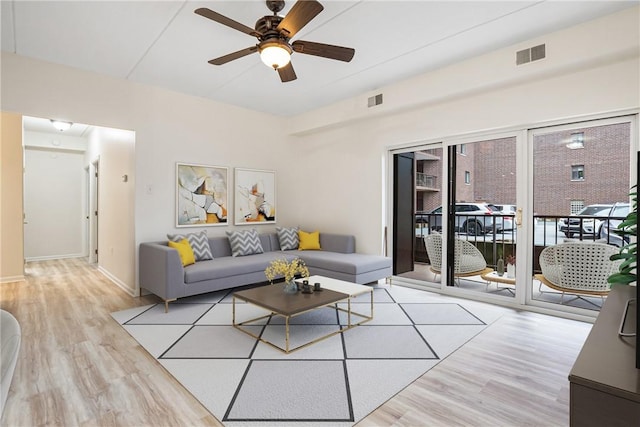 5600 Munhall Rd Unit 201, Squirrel Hill, PA 15217 - living area with ceiling fan and wood finished floors