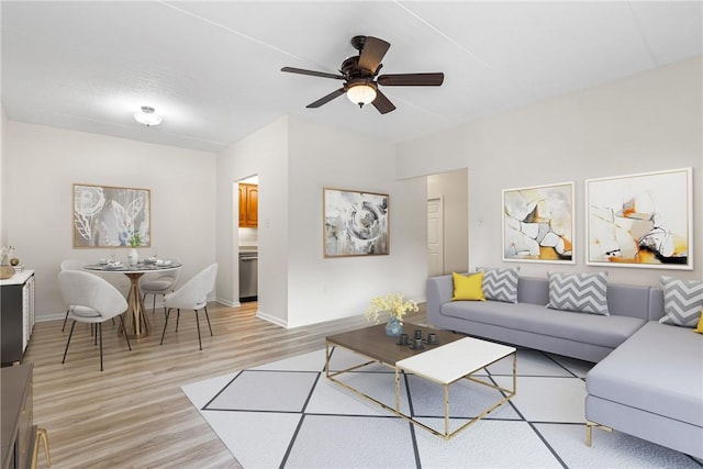 5600 Munhall Rd Unit 201, Squirrel Hill, PA 15217 - living room featuring light wood-type flooring and a ceiling fan