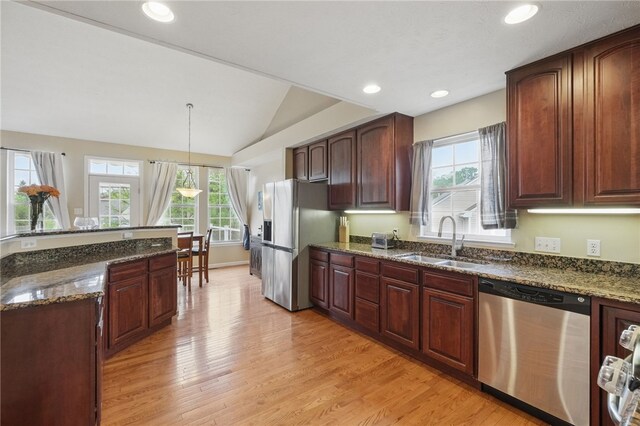 1148 Camarta Dr, Baldwin Boro, PA 15227 - kitchen featuring appliances with stainless steel finishes, a sink, light wood-style floors, healthy amount of natural light, and vaulted ceiling