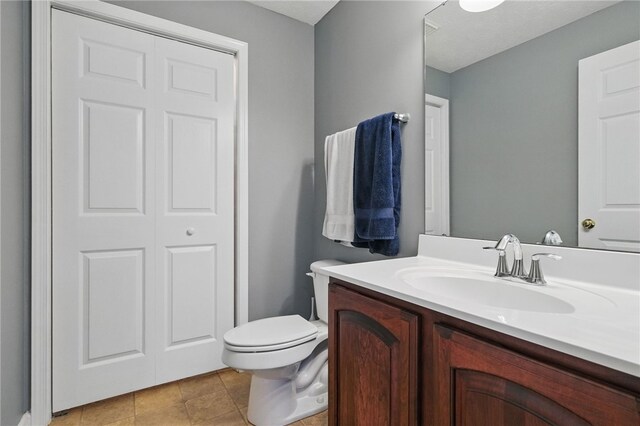 1148 Camarta Dr, Baldwin Boro, PA 15227 - bathroom featuring vanity, toilet, and tile patterned flooring