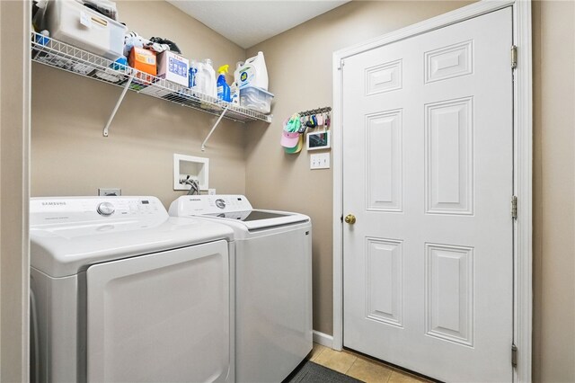 1148 Camarta Dr, Baldwin Boro, PA 15227 - laundry room featuring independent washer and dryer, light tile patterned flooring, and baseboards