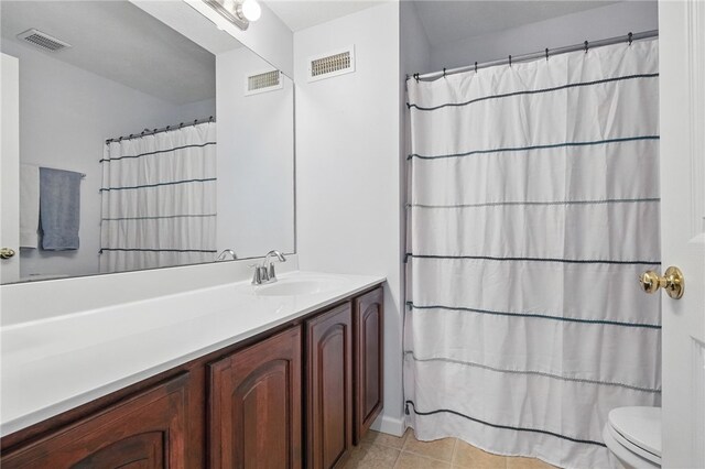 1148 Camarta Dr, Baldwin Boro, PA 15227 - bathroom with vanity, toilet, tile patterned flooring, and a shower with curtain