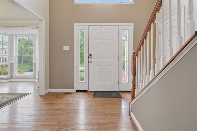 1148 Camarta Dr, Baldwin Boro, PA 15227 - entryway with hardwood / wood-style flooring, baseboards, stairway, and a high ceiling