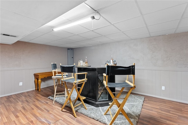 444 Tivoli Rd, Plum Boro, PA 15239 - indoor bar with wood finished floors, a paneled ceiling, and a wainscoted wall