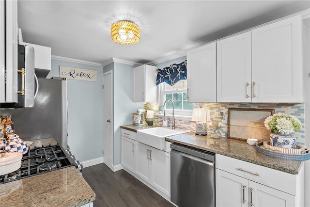 444 Tivoli Rd, Plum Boro, PA 15239 - kitchen with stainless steel appliances, a sink, decorative backsplash, crown molding, and white cabinets