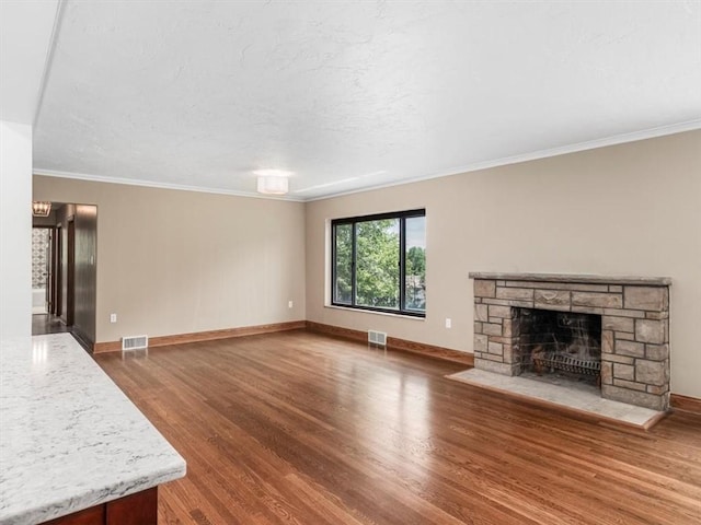 330 Center Grange Rd, Center Twp Bea, PA 15061 - unfurnished living room featuring wood finished floors, a fireplace, crown molding, baseboards, and a chandelier