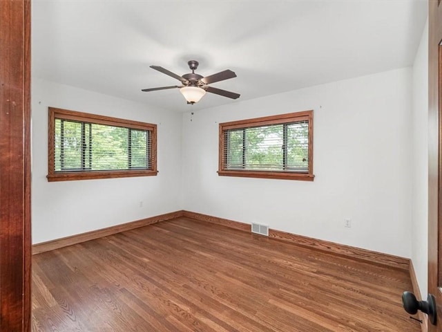 330 Center Grange Rd, Center Twp Bea, PA 15061 - empty room featuring wood finished floors, baseboards, and a ceiling fan