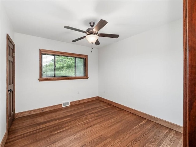 330 Center Grange Rd, Center Twp Bea, PA 15061 - unfurnished room featuring wood finished floors, baseboards, and a ceiling fan