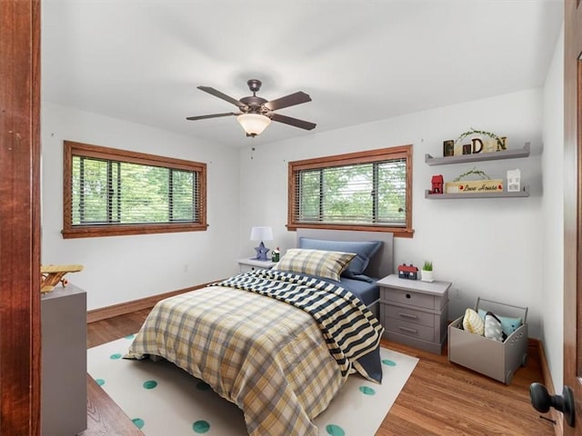 330 Center Grange Rd, Center Twp Bea, PA 15061 - bedroom featuring wood finished floors, baseboards, and ceiling fan