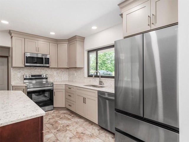 330 Center Grange Rd, Center Twp Bea, PA 15061 - kitchen with stainless steel appliances, a sink, decorative backsplash, recessed lighting, and light stone counters