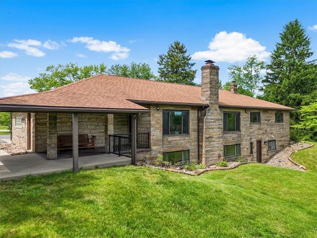 330 Center Grange Rd, Center Twp Bea, PA 15061 - back of house featuring stone siding, a chimney, a yard, a patio area, and a shingled roof