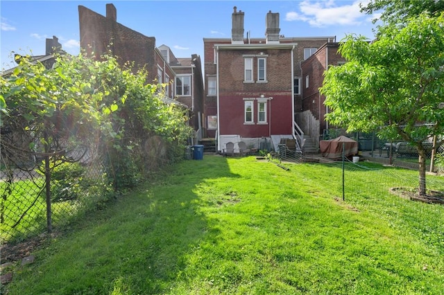 4123 Foster St, Lawrenceville, PA 15201 - rear view of house featuring brick siding