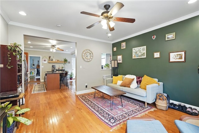 2511 Mission St, South Side, PA 15203 - living room with ceiling fan, light wood-style floors, recessed lighting, baseboards, and ornamental molding