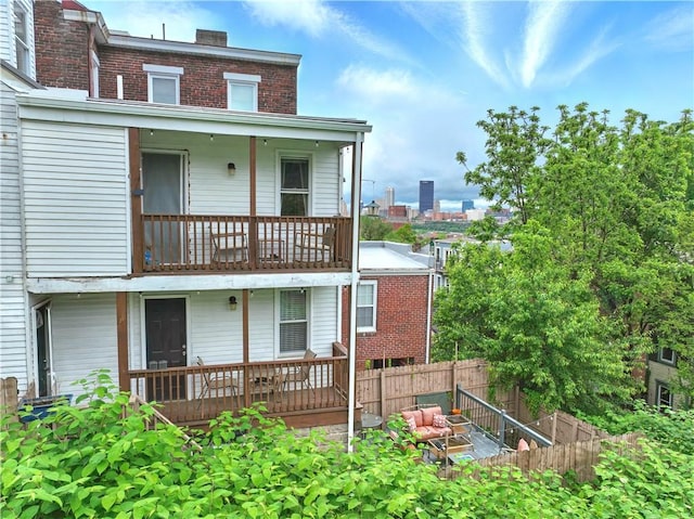 2511 Mission St, South Side, PA 15203 - back of property featuring a balcony and brick siding