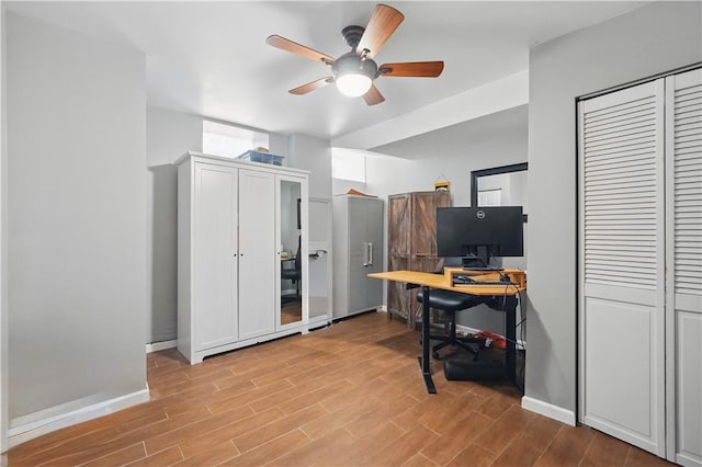 2511 Mission St, South Side, PA 15203 - home office with wood finished floors, ceiling fan, and baseboards