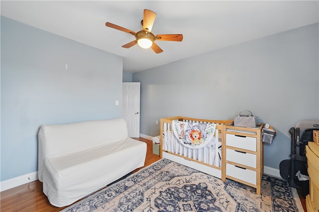 2511 Mission St, South Side, PA 15203 - bedroom with baseboards, wood finished floors, and a ceiling fan