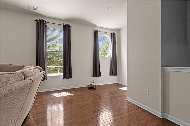 302 Pointe View Dr, Adams Twp, PA 16046 - living room featuring healthy amount of natural light, wood finished floors, and baseboards