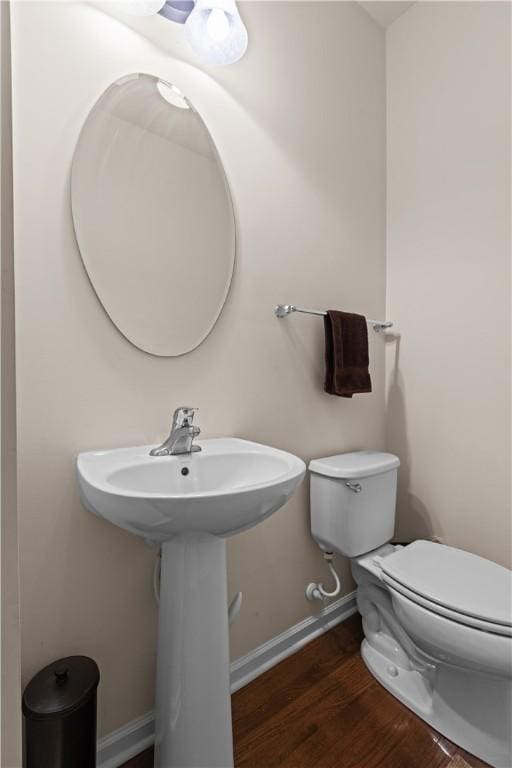 302 Pointe View Dr, Adams Twp, PA 16046 - half bath featuring toilet, baseboards, and wood finished floors