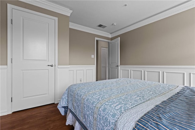 302 Pointe View Dr, Adams Twp, PA 16046 - bedroom with ornamental molding, dark wood finished floors, a wainscoted wall, and a decorative wall