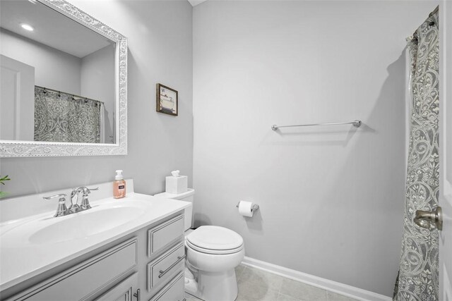 414 Greenwood Dr, North Strabane, PA 15317 - bathroom with vanity, toilet, and baseboards