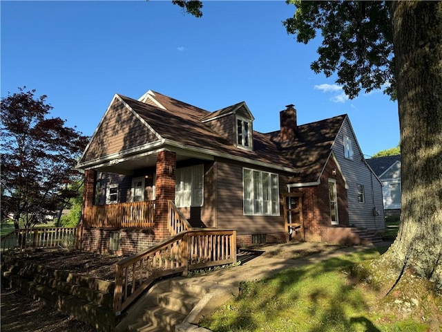 2225 Pleasantview Dr, Manor Twp, PA 16226 - view of side of property with a chimney and brick siding