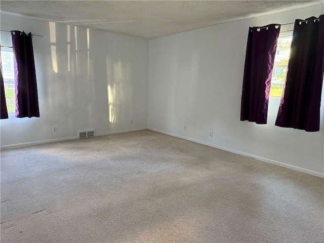 2225 Pleasantview Dr, Manor Twp, PA 16226 - spare room featuring carpet flooring, baseboards, and a textured ceiling