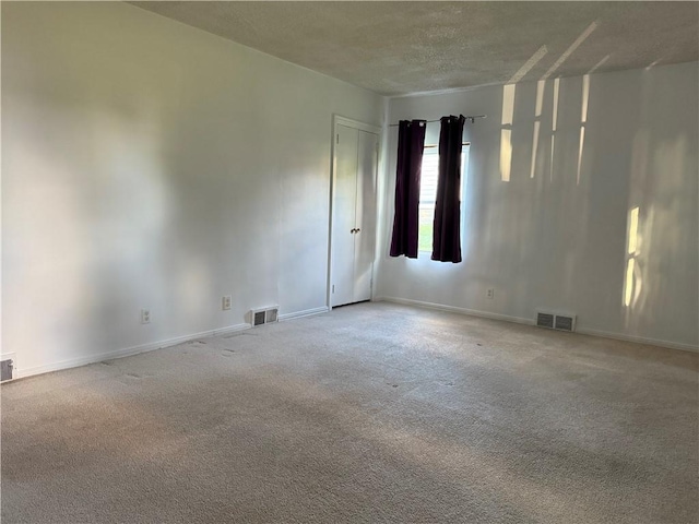 2225 Pleasantview Dr, Manor Twp, PA 16226 - carpeted spare room with baseboards and a textured ceiling