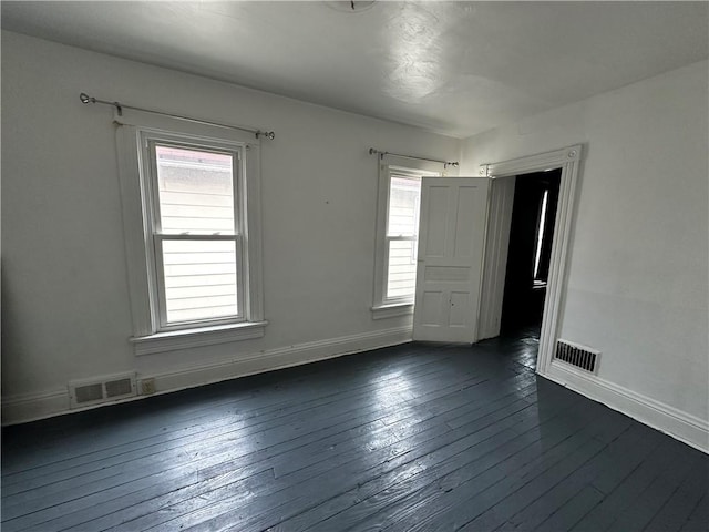 221 Friendship St, New Castle/5Th, PA 16101 - spare room with dark wood-style floors and baseboards