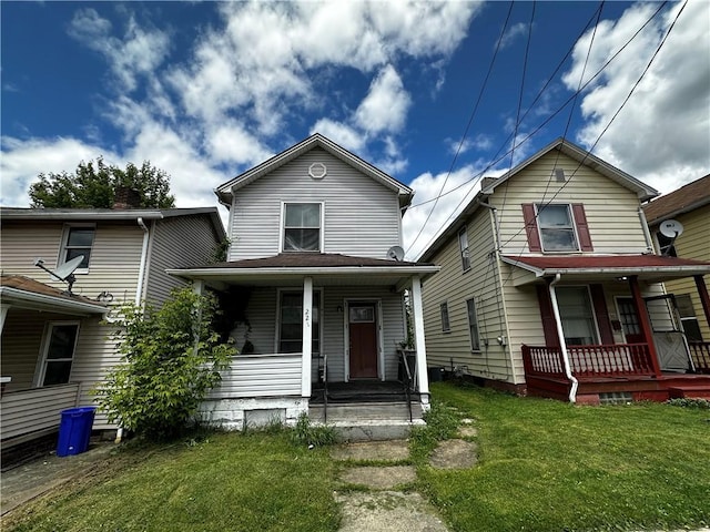 221 Friendship St, New Castle/5Th, PA 16101 - view of front of home with covered porch and a front yard
