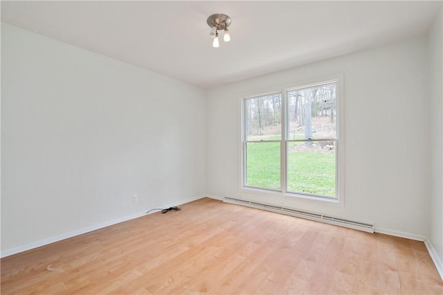 136 Wiegand Dr, Cranberry Twp, PA 16066 - unfurnished room featuring a baseboard radiator and light wood-type flooring