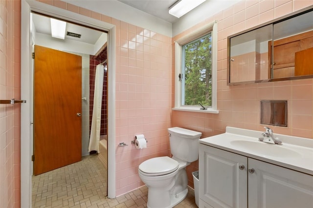 658 Bower Hill Rd, Peters Twp, PA 15367 - bathroom featuring tile walls, toilet, vanity, and shower / bath combination with curtain